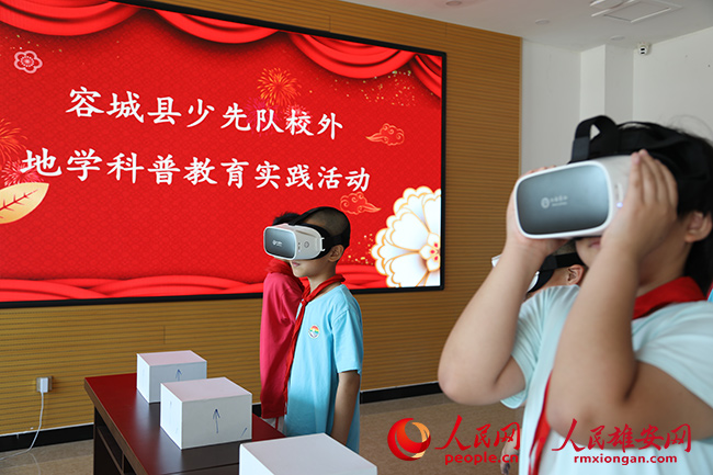 圖為少先隊員們開展實踐活動。容城縣宣傳部供圖