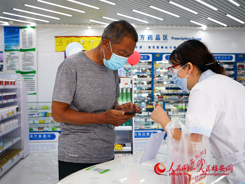 在容東片區，藥店、菜店、便利店步行5分鐘就能到，很好的解決了居民日常生活剛性需求。人民網?宋燁文攝